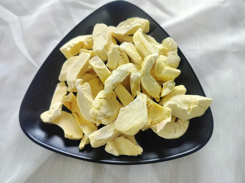 Freeze-dried durian pieces in a black dish, KHAMACO Vietnam